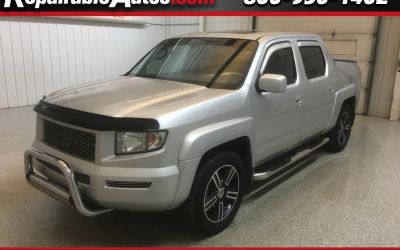 Photo of a 2006 Honda Ridgeline RTL Repairable Hail Damage for sale