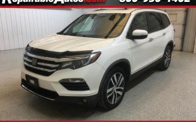 Photo of a 2018 Honda Pilot Elite 4WD Repairable Hail Damage for sale