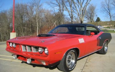 Photo of a 1971 Plymouth 'Cuda 440 Six-Pack Four Speed - Shaker Hood, Rallye Dash Loaded !! Restored for sale
