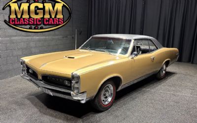 Photo of a 1967 Pontiac GTO 400CI # Match 4 Speed PHS Documented Signet Gold! for sale