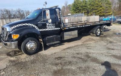 Photo of a 2011 Ford F650 Flatbed Diesel TOW Truck for sale