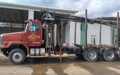 Photo of a 1994 Autocar Triaxle Logging Truck for sale