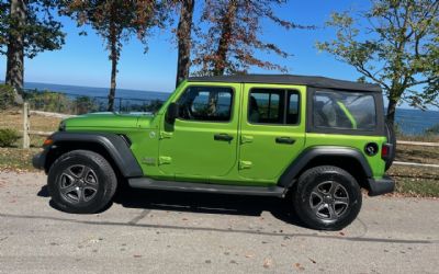 Photo of a 2018 Jeep Wrangler Unlimited Sport 4X4 In Vibrant Mojito Green Metallic Clear Coat for sale