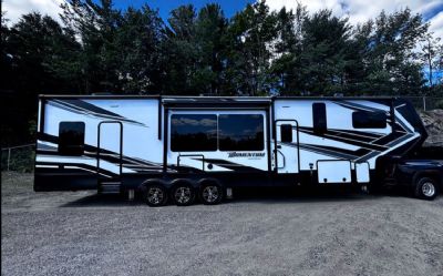 Photo of a 2021 Grand Design Momentum 397TH Toy Hauler for sale