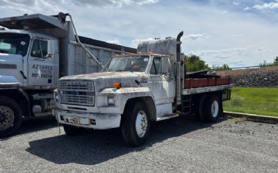 Photo of a 1990 Ford L700 Flatbed Truck for sale