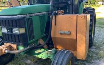 Photo of a 2001 John Deere 6300 Boom Mower / Tree Trimmer for sale