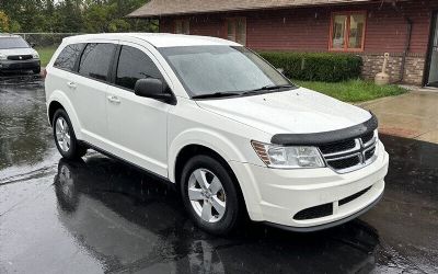 Photo of a 2015 Dodge Journey American Value Package SUV for sale